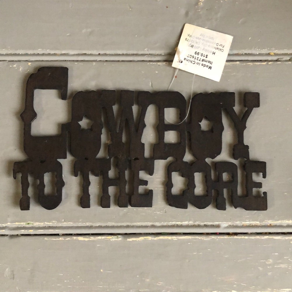 Metal “Cowboy to the Core” sign